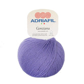 Coperta con cuori: gomitolo di lana merino extrafine viola, morbida e uniforme, con etichetta Adriafil Genziana